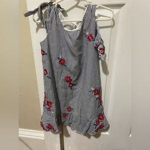 Blue and white striped sleeveless dress with floral design